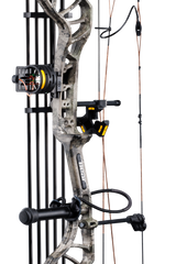 Close up of the Bear Species bow, the Species XT RTH Extra, showcasing some of the RTH package items including the sight, whisker biscuit, and stabilizer. 